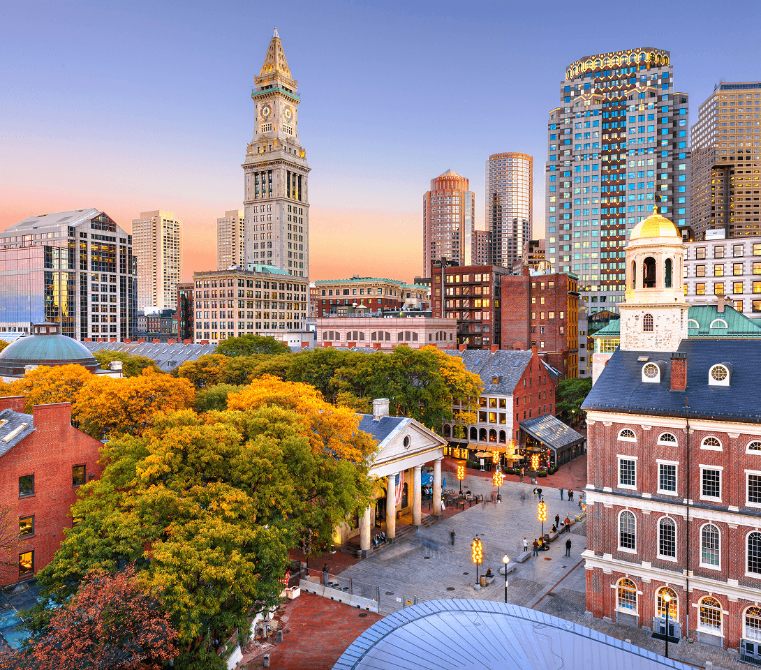 Downtown Boston skyline in autumn at dusk.