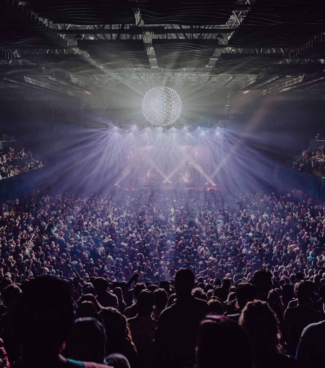Concert with crowd and lights at the Mission Ballroom.