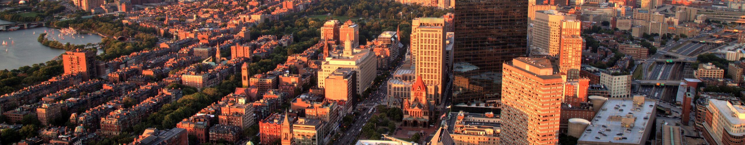 Aerial view of downtown Boston, Massachusetts, at sunset.