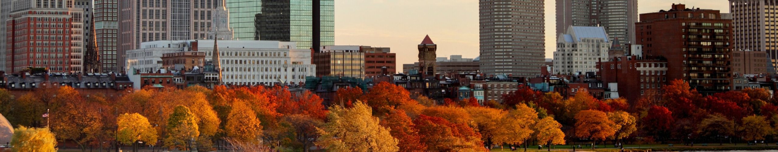 Autumn colors along the Charles River and Back Bay skyline of Boston, Massachusetts.