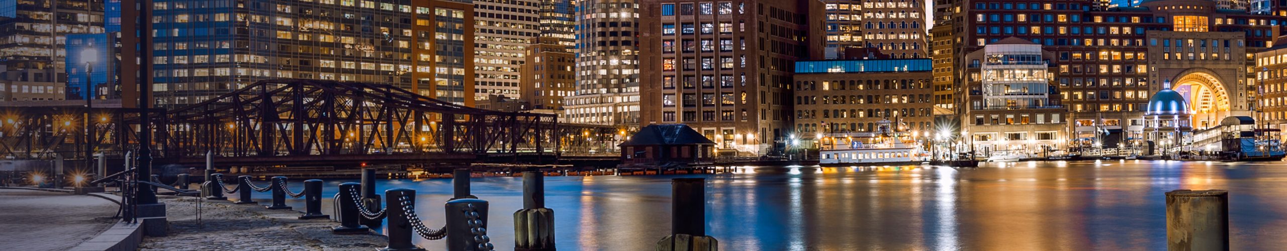 Boston, Massachusetts skyline at sunset.