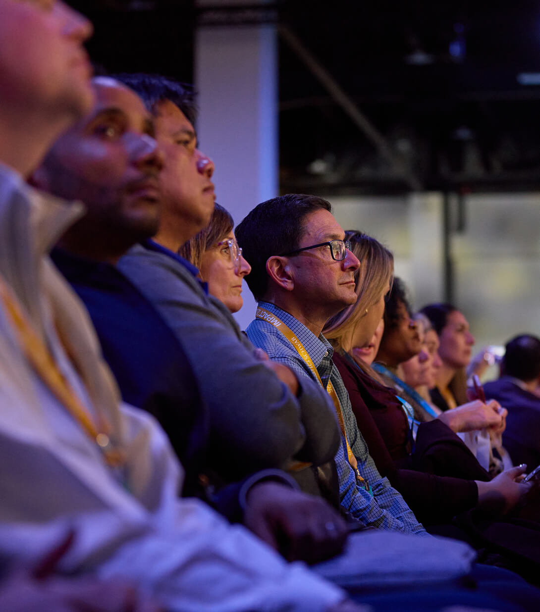 Close-up of audience at IMPACT 2025.