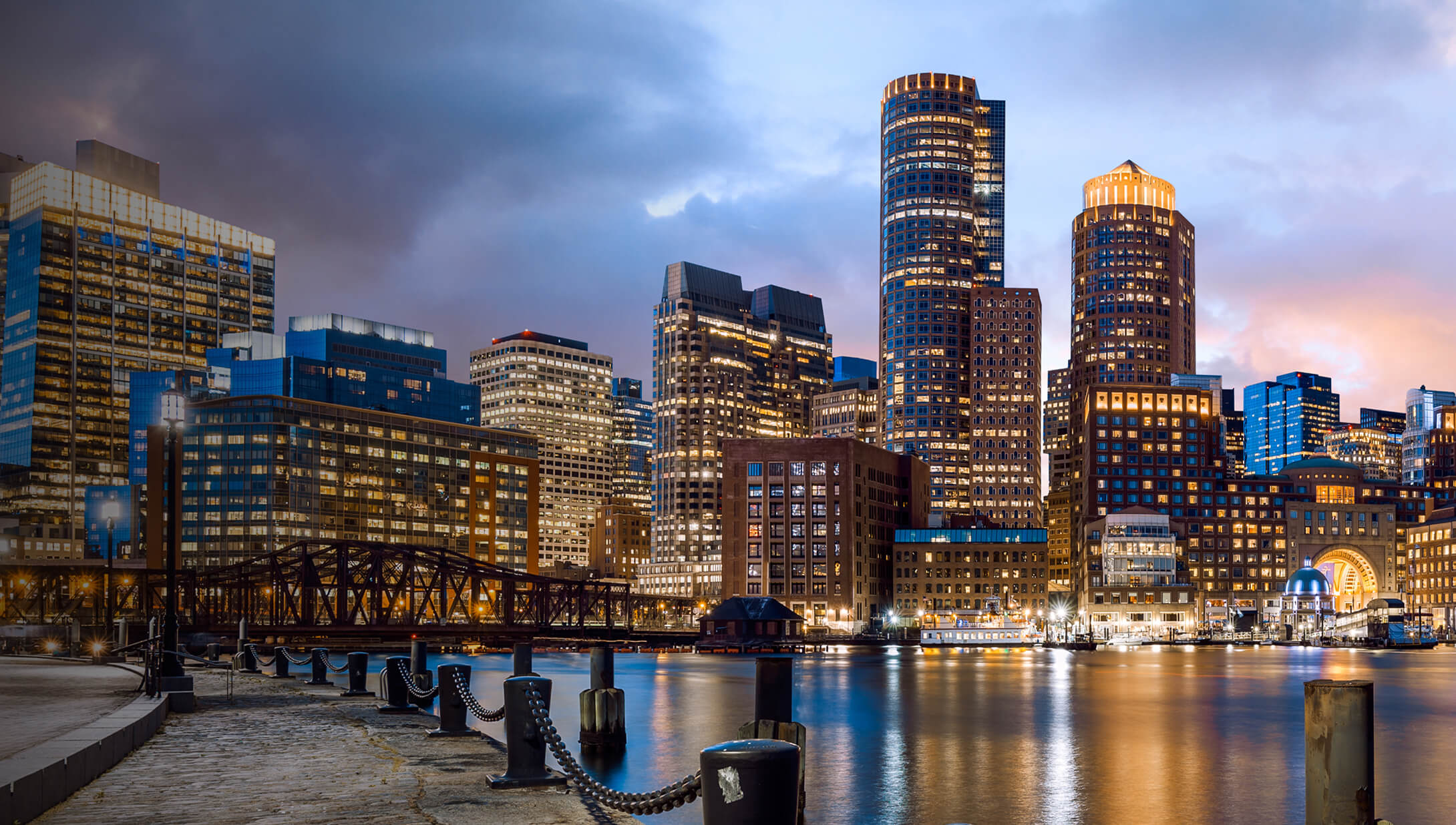 Boston, Massachusetts skyline at sunset.