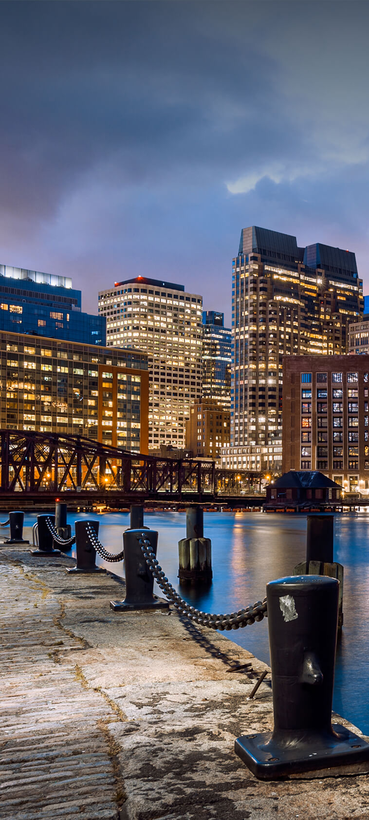 Boston, Massachusetts skyline at sunset.