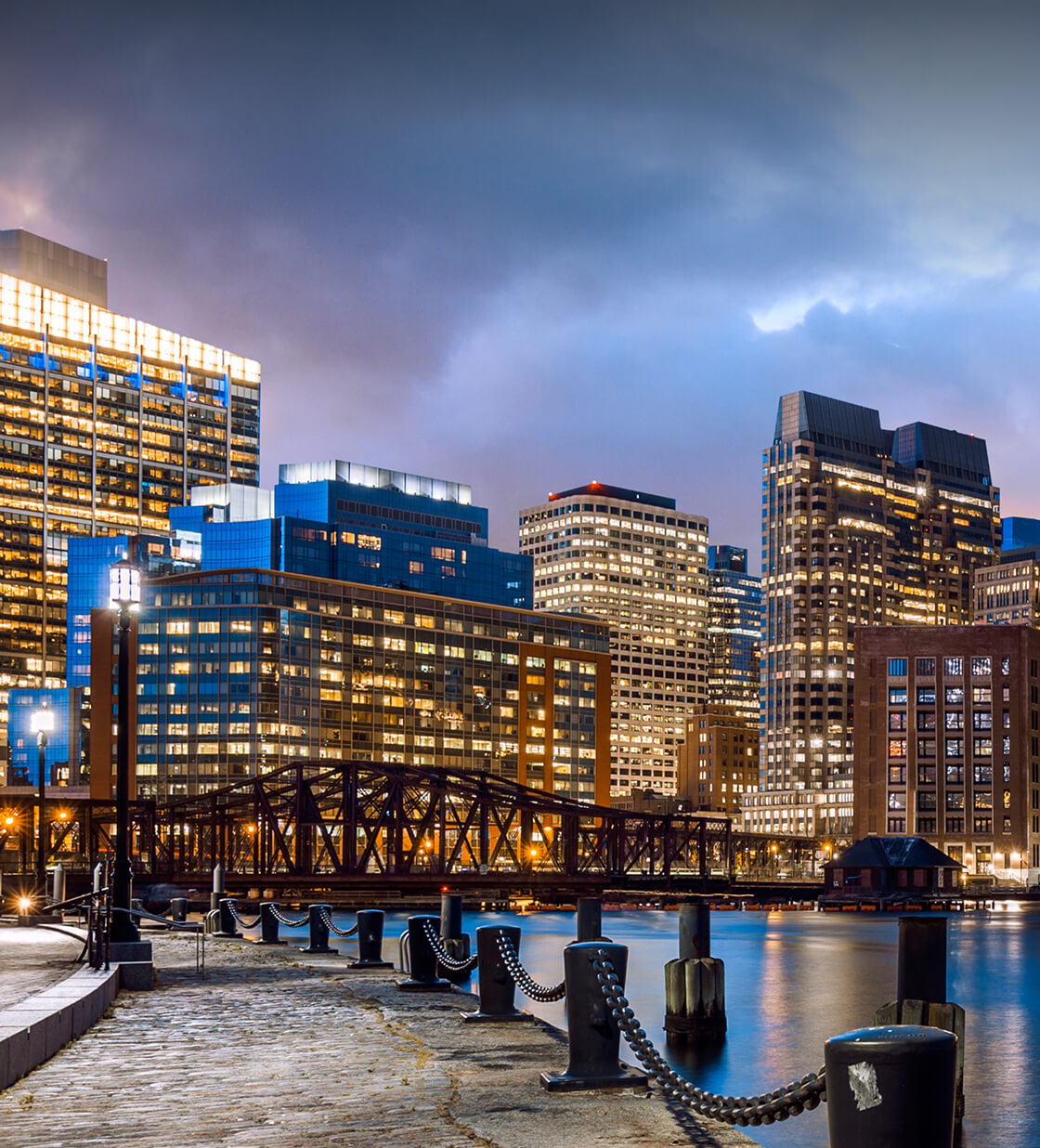 Boston, Massachusetts skyline at sunset.