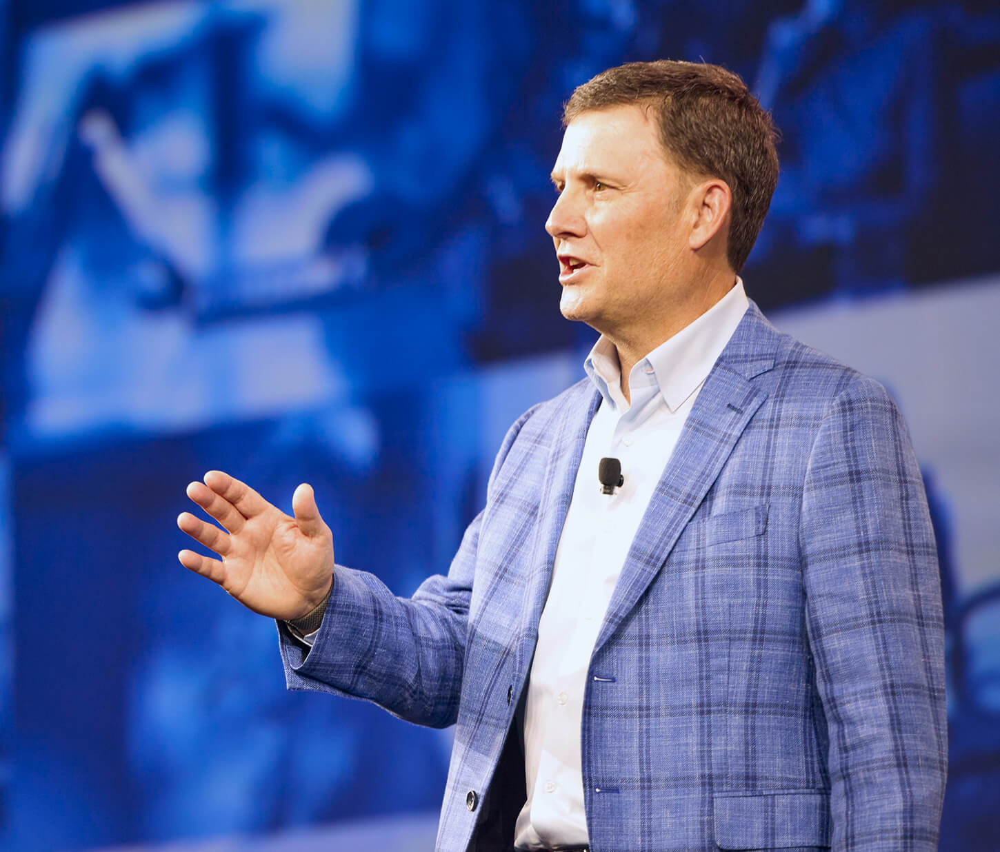 Jon Beatty, head of Schwab Advisor Services, speaking onstage at IMPACT 2025.